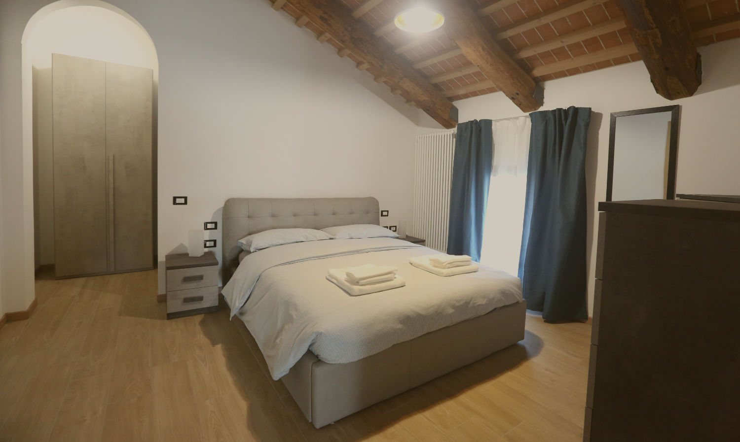 In questa immagine è mostrata la stanza da letto di una camera del Residence Superstar a San Martino di Lupari